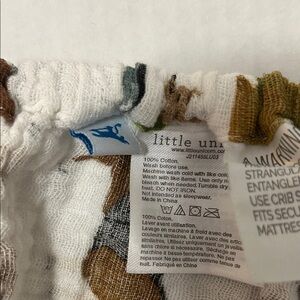 Little Unicorn fitted crib sheet “Woof”